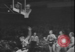 Image of basketball game between City College and BYU New York United States USA, 1950, second 60 stock footage video 65675058712