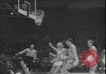 Image of basketball game between City College and BYU New York United States USA, 1950, second 61 stock footage video 65675058712