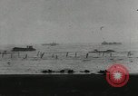 Image of 1st Infantry Division landing on D-Day Normandy France, 1944, second 49 stock footage video 65675058745