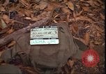 Image of thatched roof hut Pleiku South Vietnam, 1966, second 4 stock footage video 65675058783