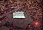 Image of thatched roof hut Pleiku South Vietnam, 1966, second 5 stock footage video 65675058783