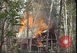 Image of thatched roof hut Pleiku South Vietnam, 1966, second 32 stock footage video 65675058783