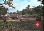 Image of thatched roof hut Pleiku South Vietnam, 1966, second 47 stock footage video 65675058783
