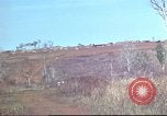 Image of Vietnamese huts Vietnam, 1966, second 16 stock footage video 65675058797