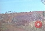 Image of Vietnamese huts Vietnam, 1966, second 17 stock footage video 65675058797