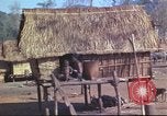 Image of Vietnamese huts Vietnam, 1966, second 18 stock footage video 65675058797