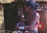 Image of Vietnamese huts Vietnam, 1966, second 36 stock footage video 65675058797