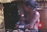 Image of Vietnamese huts Vietnam, 1966, second 41 stock footage video 65675058797