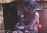 Image of Vietnamese huts Vietnam, 1966, second 42 stock footage video 65675058797