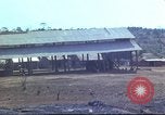 Image of Vietnamese huts Vietnam, 1966, second 47 stock footage video 65675058797