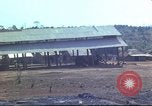 Image of Vietnamese huts Vietnam, 1966, second 48 stock footage video 65675058797