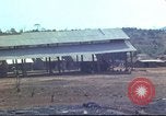 Image of Vietnamese huts Vietnam, 1966, second 49 stock footage video 65675058797