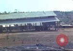 Image of Vietnamese huts Vietnam, 1966, second 50 stock footage video 65675058797