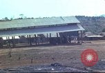 Image of Vietnamese huts Vietnam, 1966, second 52 stock footage video 65675058797