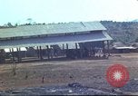 Image of Vietnamese huts Vietnam, 1966, second 53 stock footage video 65675058797