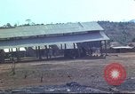 Image of Vietnamese huts Vietnam, 1966, second 54 stock footage video 65675058797