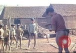 Image of Vietnamese villagers Vietnam, 1966, second 33 stock footage video 65675058800