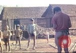 Image of Vietnamese villagers Vietnam, 1966, second 36 stock footage video 65675058800