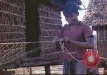 Image of Vietnamese villagers Vietnam, 1966, second 44 stock footage video 65675058800