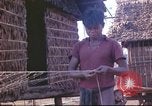 Image of Vietnamese villagers Vietnam, 1966, second 52 stock footage video 65675058800