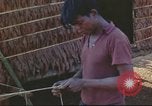 Image of Vietnamese villagers Vietnam, 1966, second 56 stock footage video 65675058800