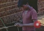 Image of Vietnamese villagers Vietnam, 1966, second 58 stock footage video 65675058800