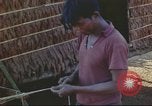 Image of Vietnamese villagers Vietnam, 1966, second 62 stock footage video 65675058800
