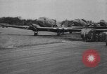 Image of U.S. Paratroopers preparing and departing for airdrop over Normandy England United Kingdom, 1944, second 1 stock footage video 65675058844