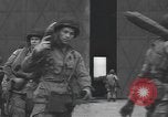 Image of U.S. Paratroopers preparing and departing for airdrop over Normandy England United Kingdom, 1944, second 62 stock footage video 65675058844