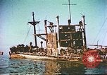 Image of damaged ship Manila Philippines, 1945, second 4 stock footage video 65675058923