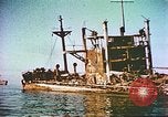 Image of damaged ship Manila Philippines, 1945, second 7 stock footage video 65675058923