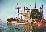 Image of damaged ship Manila Philippines, 1945, second 8 stock footage video 65675058923