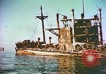 Image of damaged ship Manila Philippines, 1945, second 9 stock footage video 65675058923