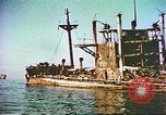 Image of damaged ship Manila Philippines, 1945, second 10 stock footage video 65675058923