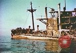 Image of damaged ship Manila Philippines, 1945, second 13 stock footage video 65675058923