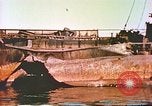 Image of damaged ship Manila Philippines, 1945, second 22 stock footage video 65675058923