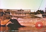Image of damaged ship Manila Philippines, 1945, second 23 stock footage video 65675058923