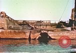Image of damaged ship Manila Philippines, 1945, second 25 stock footage video 65675058923