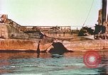 Image of damaged ship Manila Philippines, 1945, second 28 stock footage video 65675058923