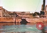 Image of damaged ship Manila Philippines, 1945, second 29 stock footage video 65675058923