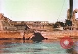 Image of damaged ship Manila Philippines, 1945, second 30 stock footage video 65675058923