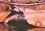 Image of damaged ship Manila Philippines, 1945, second 33 stock footage video 65675058923
