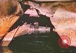 Image of damaged ship Manila Philippines, 1945, second 36 stock footage video 65675058923