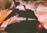 Image of damaged ship Manila Philippines, 1945, second 37 stock footage video 65675058923