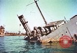 Image of damaged ship Manila Philippines, 1945, second 46 stock footage video 65675058923