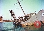 Image of damaged ship Manila Philippines, 1945, second 47 stock footage video 65675058923