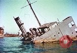 Image of damaged ship Manila Philippines, 1945, second 48 stock footage video 65675058923