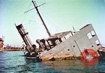 Image of damaged ship Manila Philippines, 1945, second 49 stock footage video 65675058923