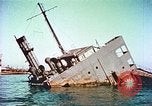 Image of damaged ship Manila Philippines, 1945, second 50 stock footage video 65675058923