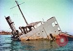 Image of damaged ship Manila Philippines, 1945, second 51 stock footage video 65675058923